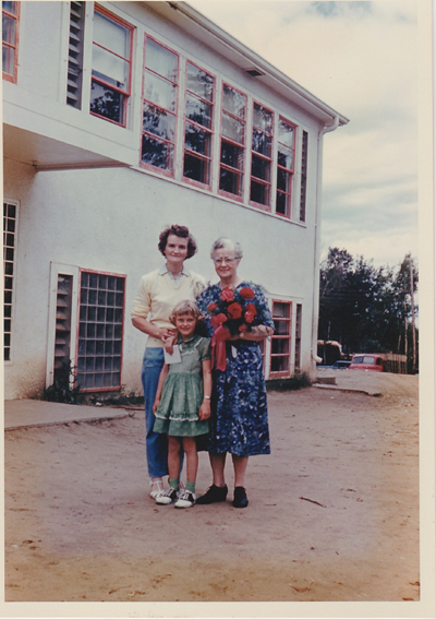   Ormas retirement 1959  Orma presented with a retirement bouquet in front of the new East Central School.  